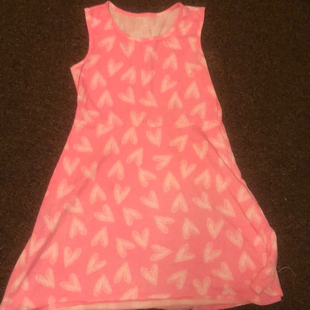 A pink dress with hearts on it super soft